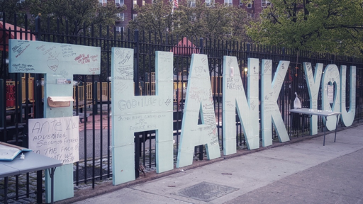 thank you sign with signatures outside of hospital