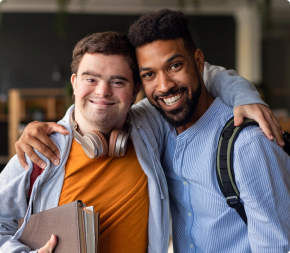 Image of two hospital employees with diverse backgrounds