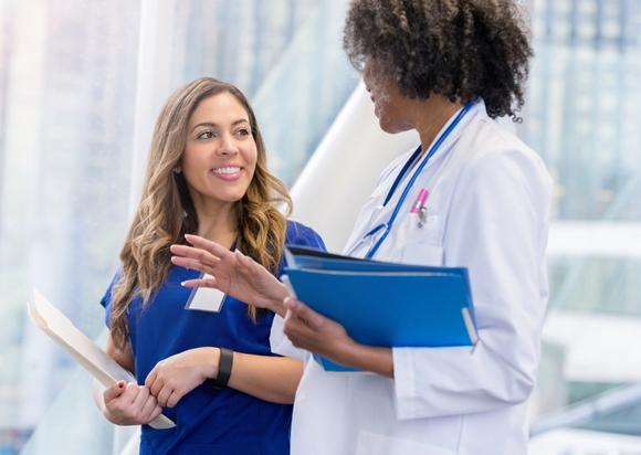 two female doctors talking